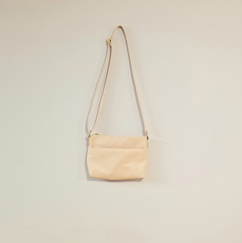 Pink crossbody bag.
